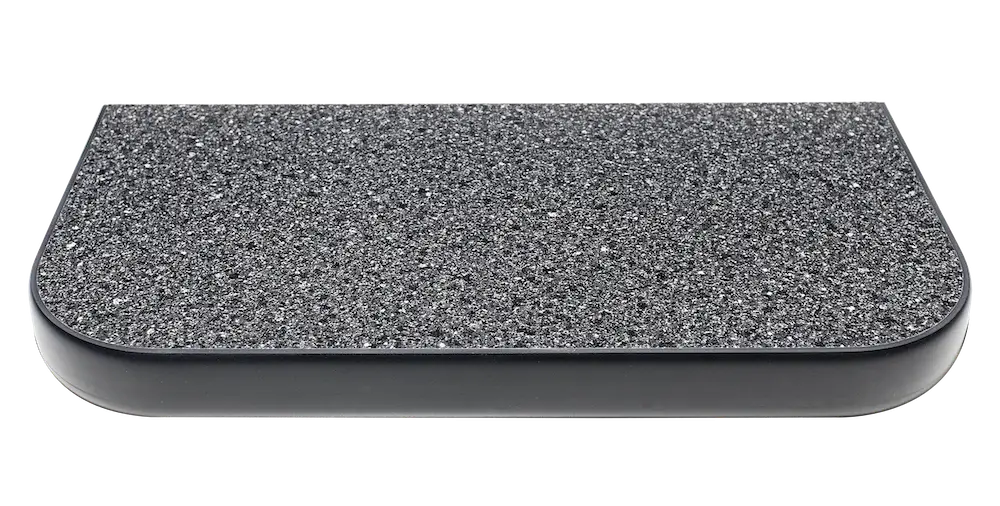 Ebony Star Counter with a dark speckled surface and rounded edges.