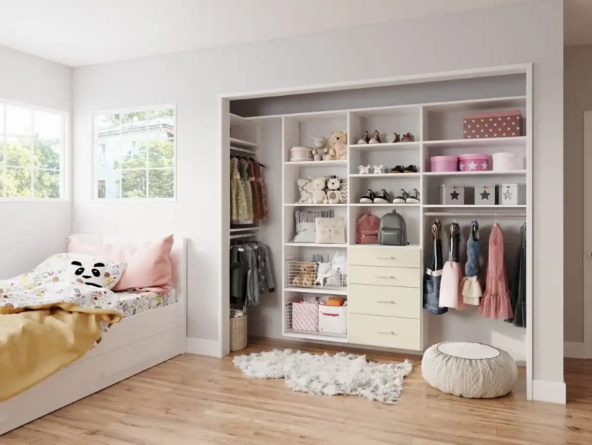 Child’s bedroom closet with open shelving, hanging and a reading nook by Famille Closets
