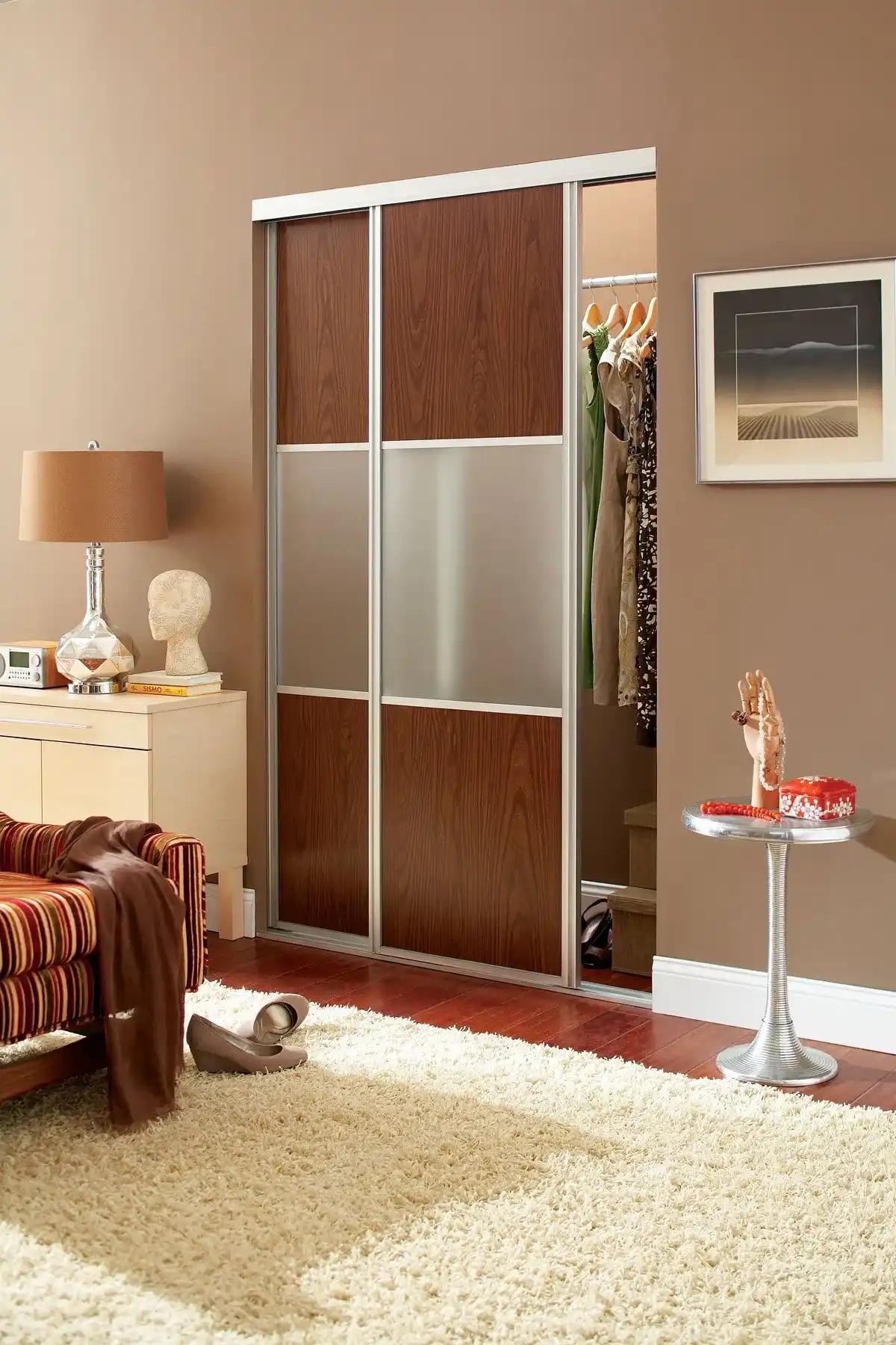 Woodgrain and frosted-glass sliding-door wardrobe by Famille Closets