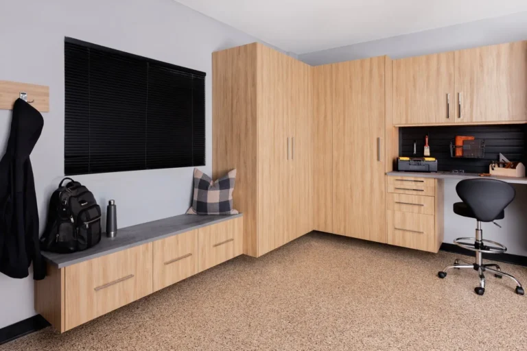 Dakota woodgrain garage with workbench in the Edmonton area, after Famille Closets installation