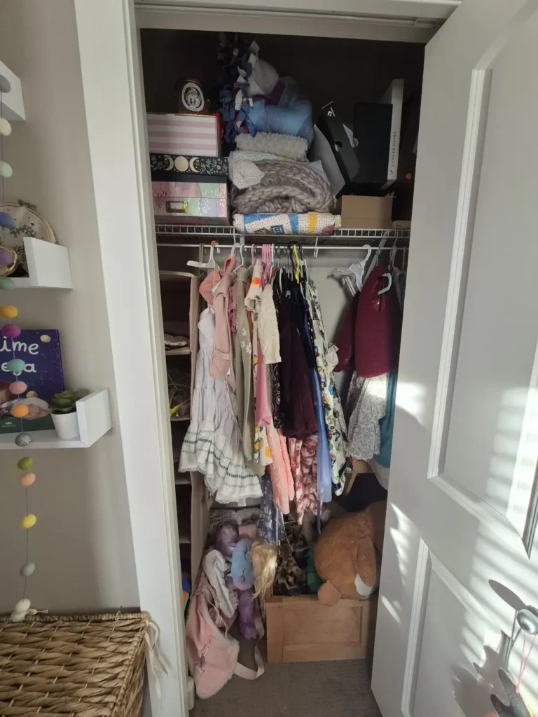 Kids’ closet in the Edmonton area before Famille Closets installation