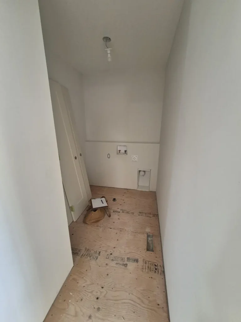 Laundry room in the Edmonton area before Famille Closets installation