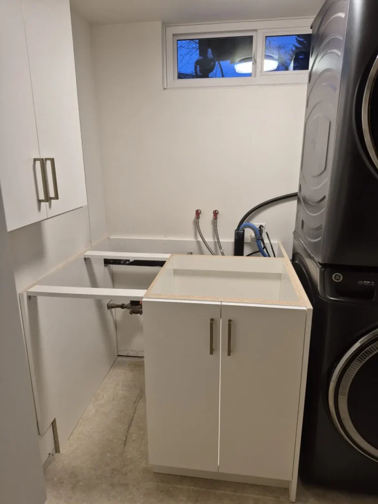 Basement laundry room in the Edmonton area, after Famille Closets installation