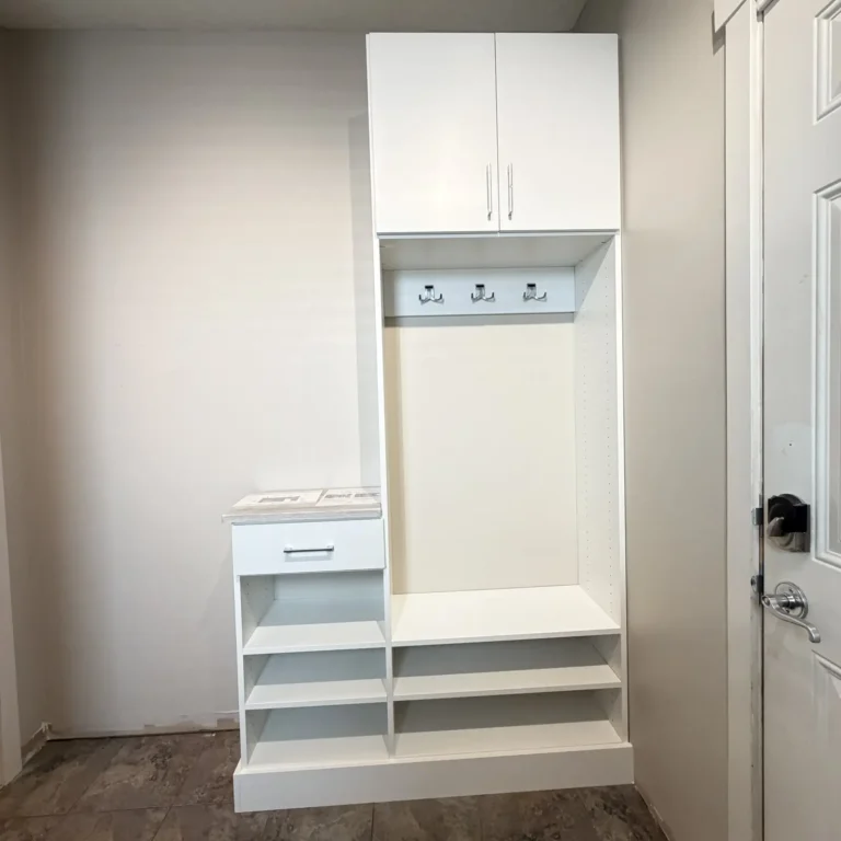 Entry bench with coat hooks in Terwillegar, Edmonton, after Famille Closets installation