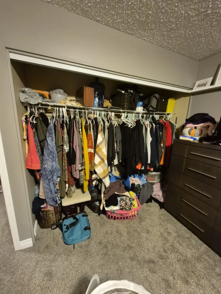 Reach-in closet in the Edmonton area before Famille Closets installation