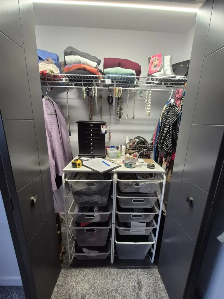 Reach-in closet in the Edmonton area before Famille Closets installation
