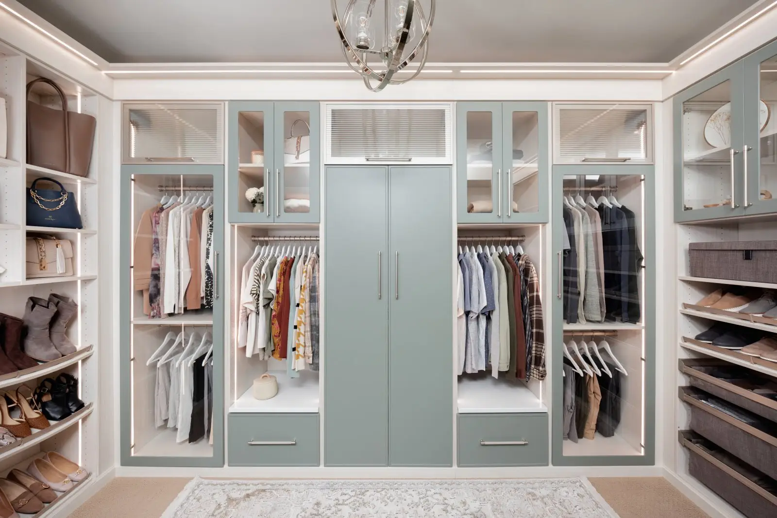 Arctic and spruce walk-in closet with vanity in the Edmonton area, after Famille Closets installation