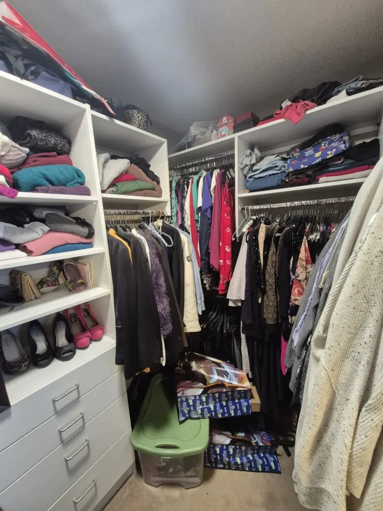 Walk-in closet in the Edmonton area before Famille Closets installation