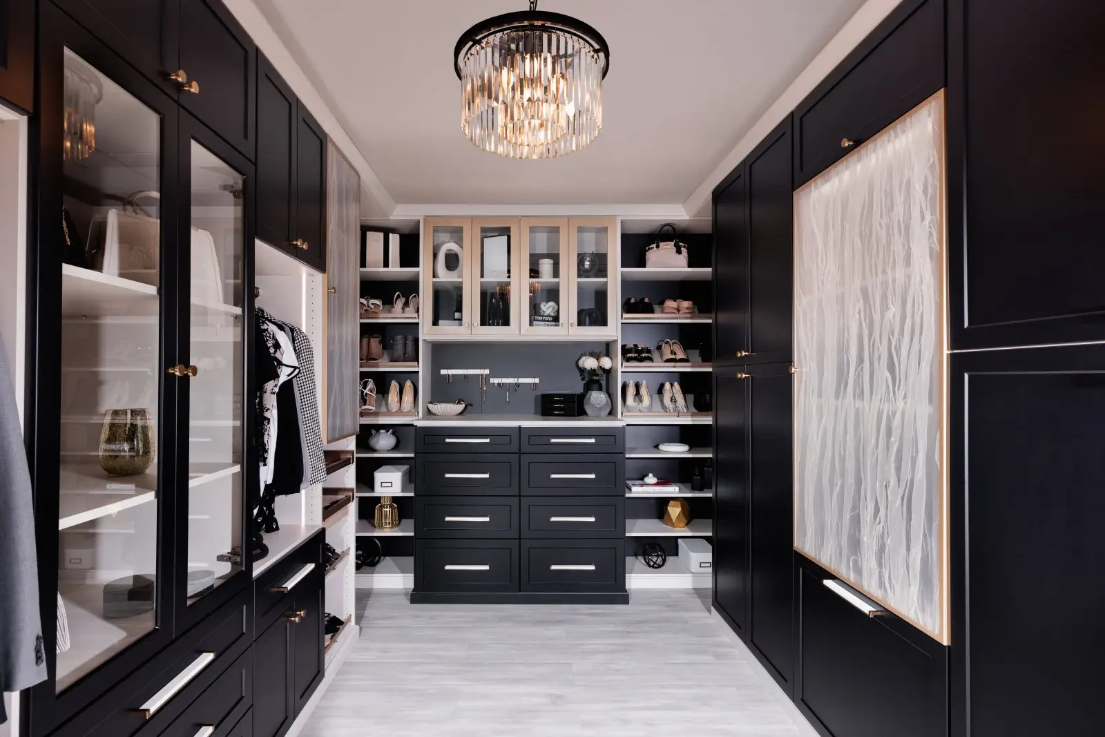 Black and vintage walk-in closet in the Edmonton area, after Famille Closets installation