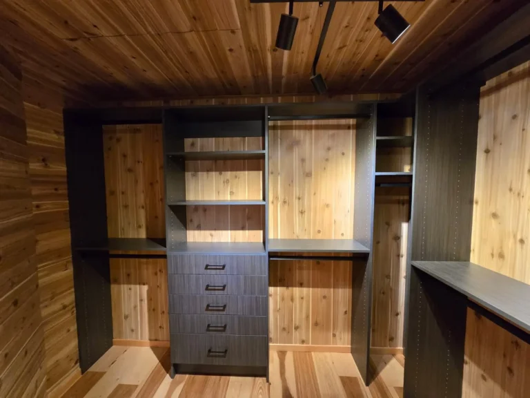 Licorice closets against cedar walls in the Edmonton area, after Famille Closets installation