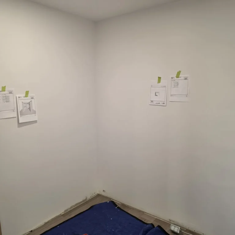 Walk-in closet in Sherwood Park before Famille Closets installation