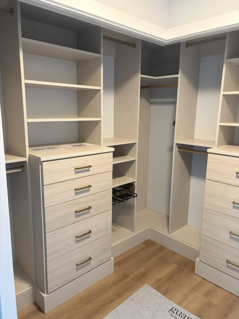 Vintage walk-in closet with drawer towers in St. Albert, after Famille Closets installation