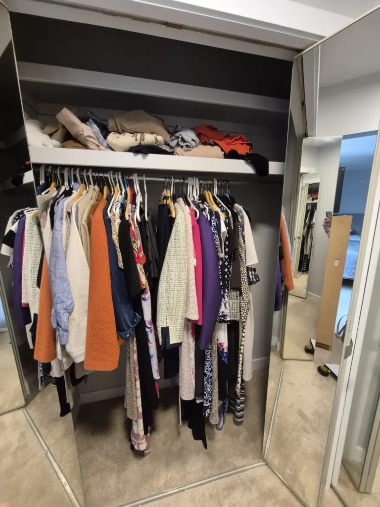 Walk-in closet in St. Albert before Famille Closets installation
