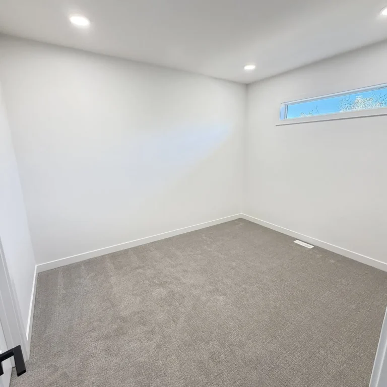 Walk-in closet in the Edmonton area before Famille Closets installation
