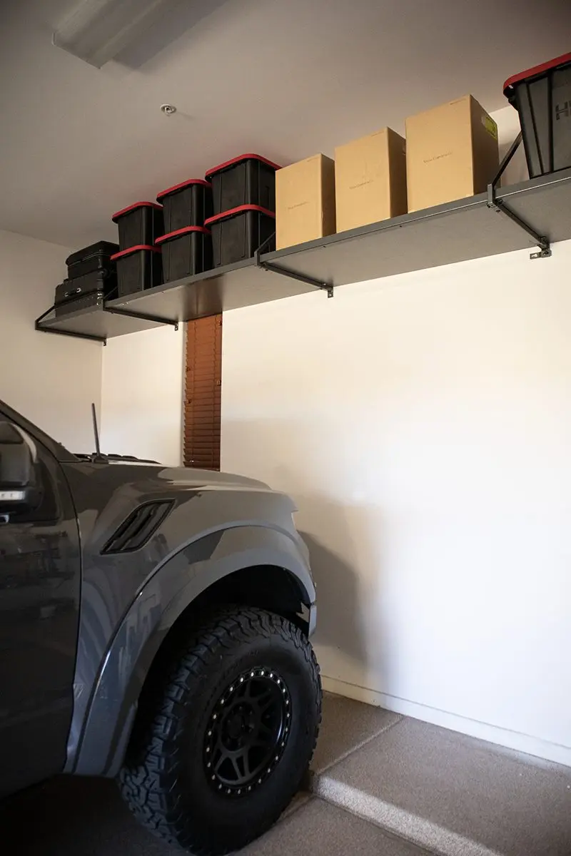 Ceiling rack in inverted position by Famille Closets