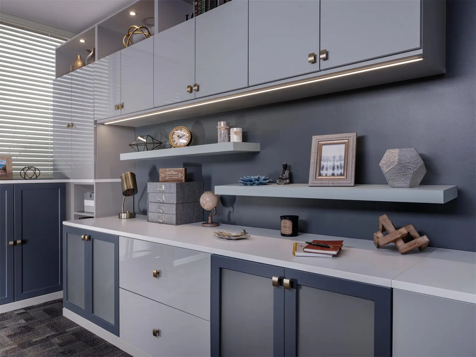 Grey and navy workspace with upper cabinets, floating shelves and a long desk by Famille Closets