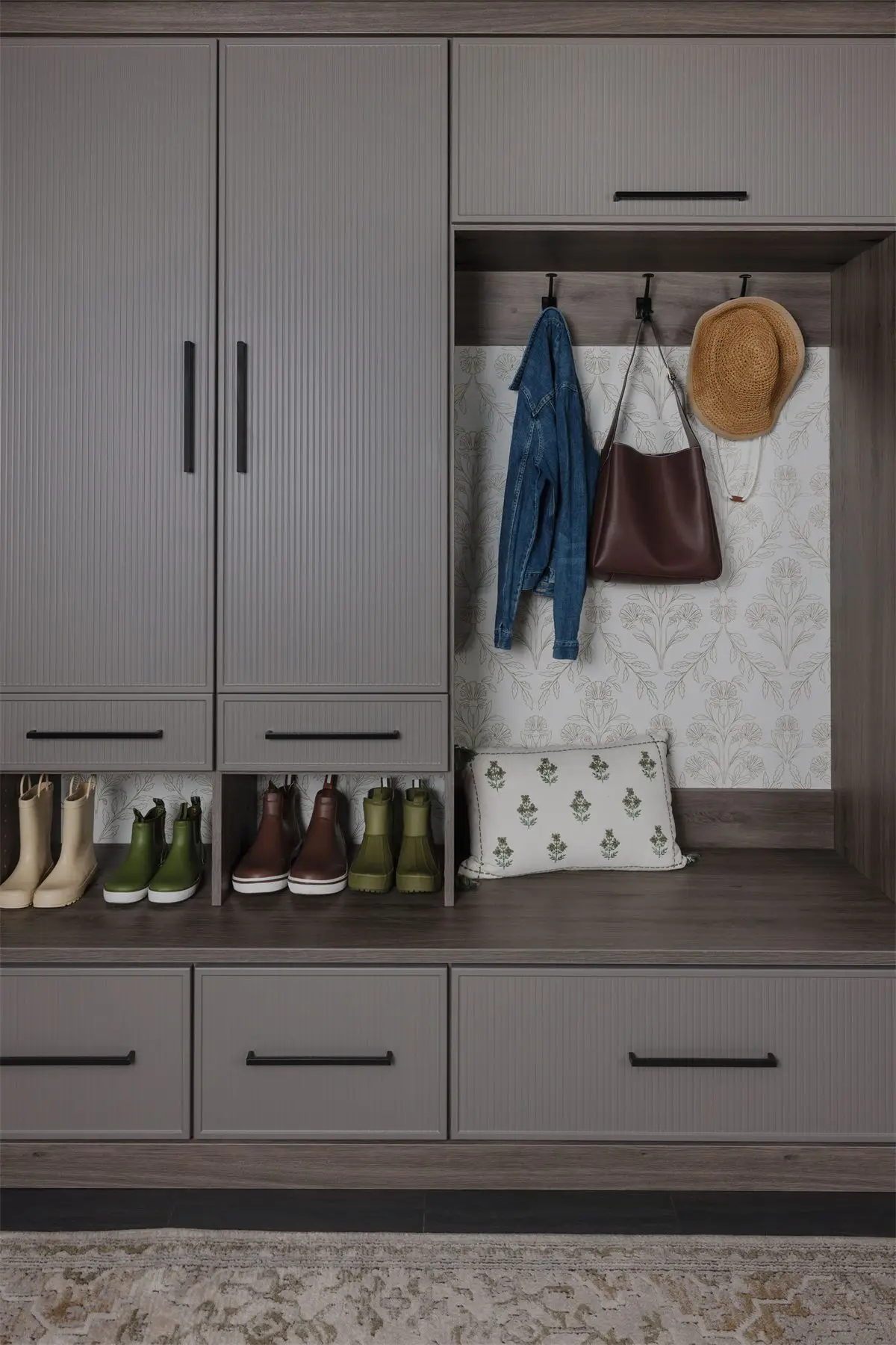 Mudroom bench with cubbies and hooks by Famille Closets