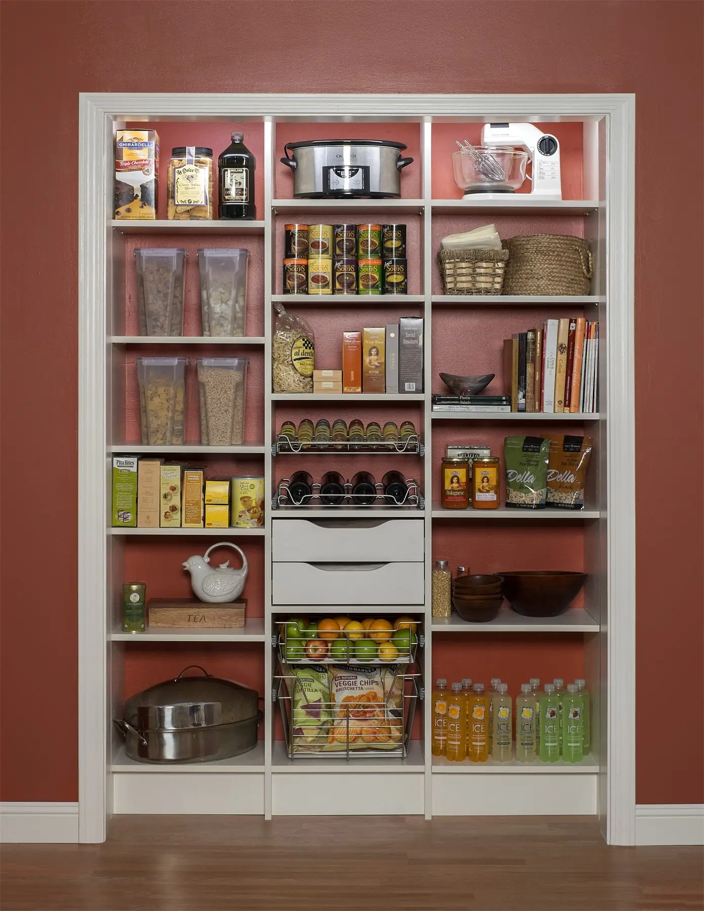 Pantry with drawers and adjustable shelves by Famille Closets