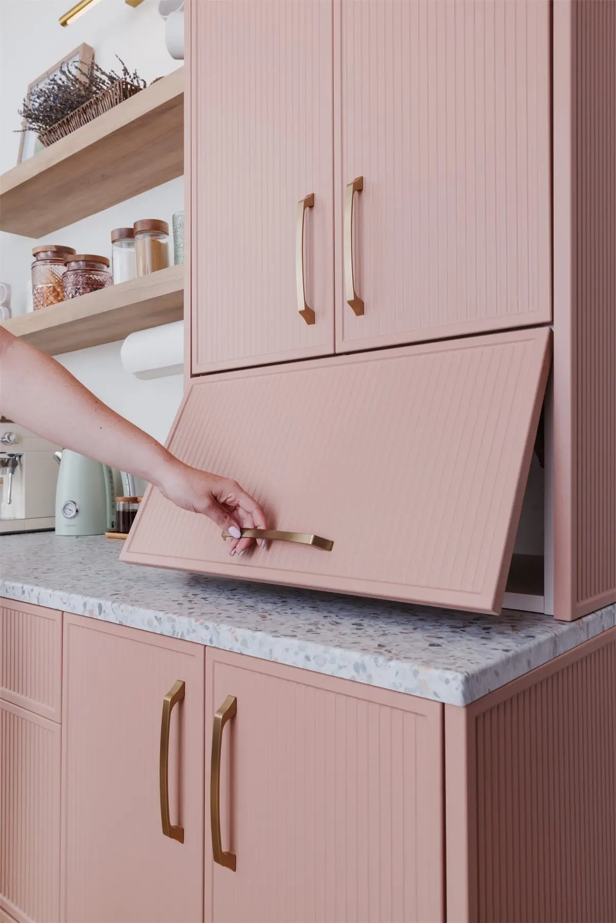 Lift-up cabinet door by Famille Closets
