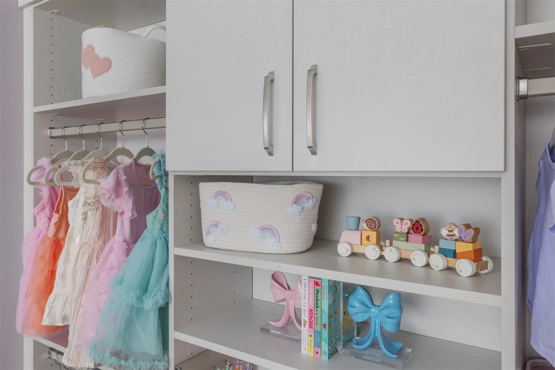 Kids closet shelves and drawers by Famille Closets