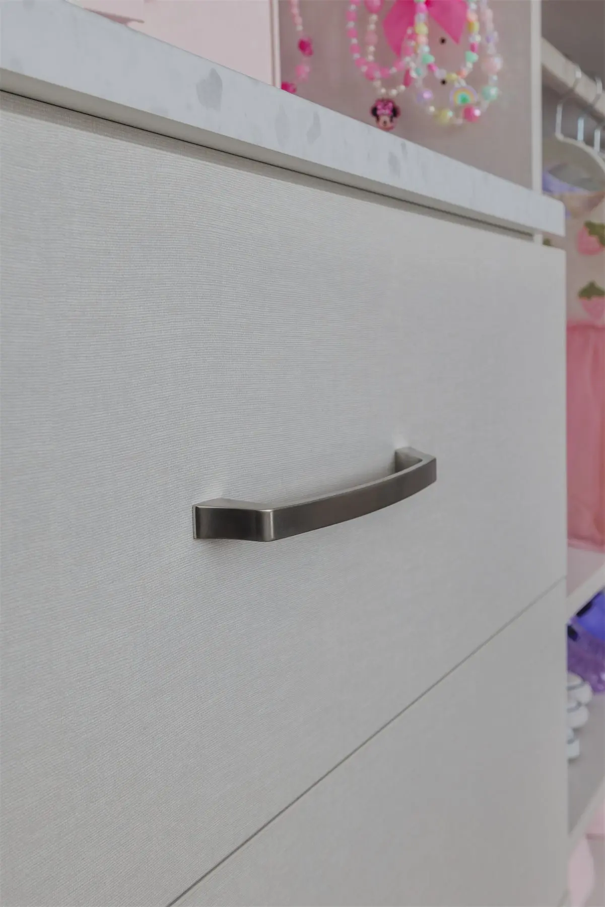 Drawer stack in a reach-in closet by Famille Closets