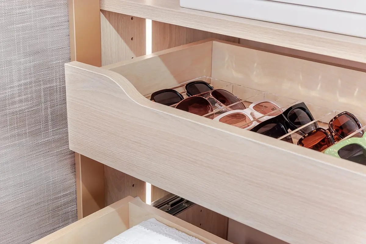 Scoop-front drawers for accessories by Famille Closets