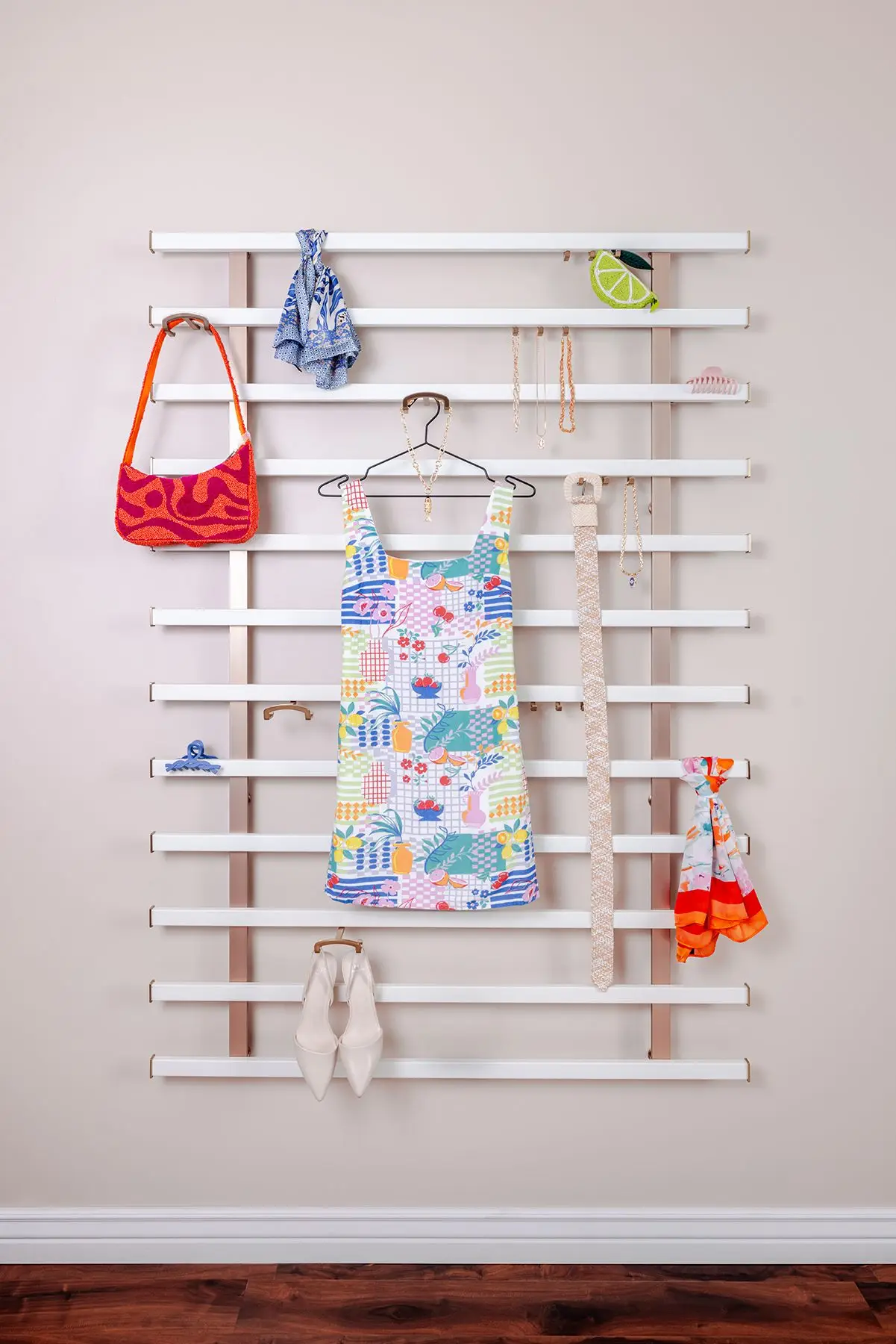 Wall-mounted accessory organizer by Famille Closets